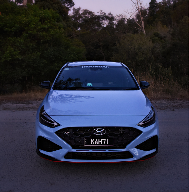 Blue Hyundai i30n with KHA7I plate content 